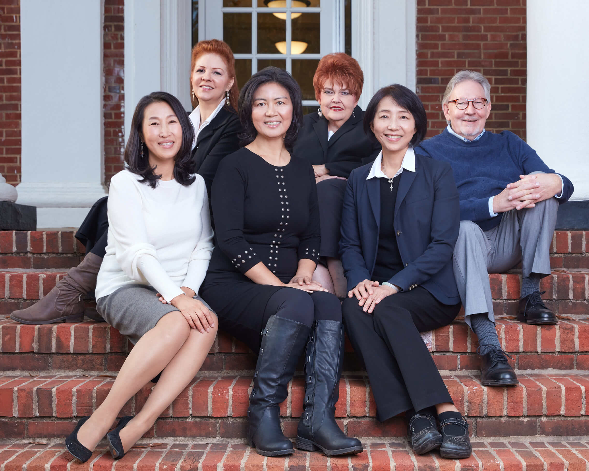 honeynest-realty-team-outdoor-group-photo-charlotte-nc Honeynest Realty team group photo taken outdoors in Charlotte, NC.