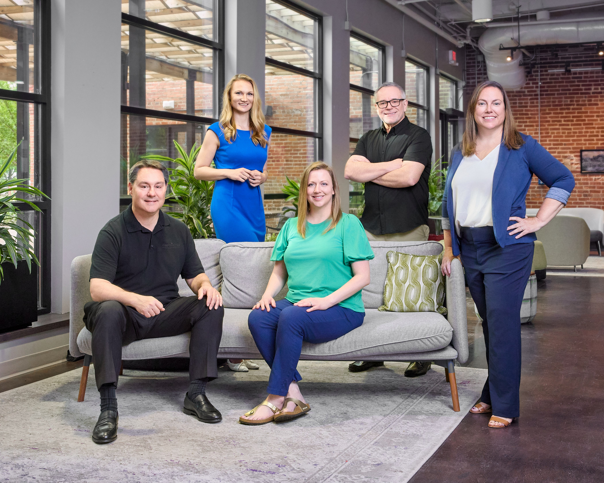 Corporate Team Group Portrait Office Setting Charlotte NC Group portrait of business professional posing together in an office setting.