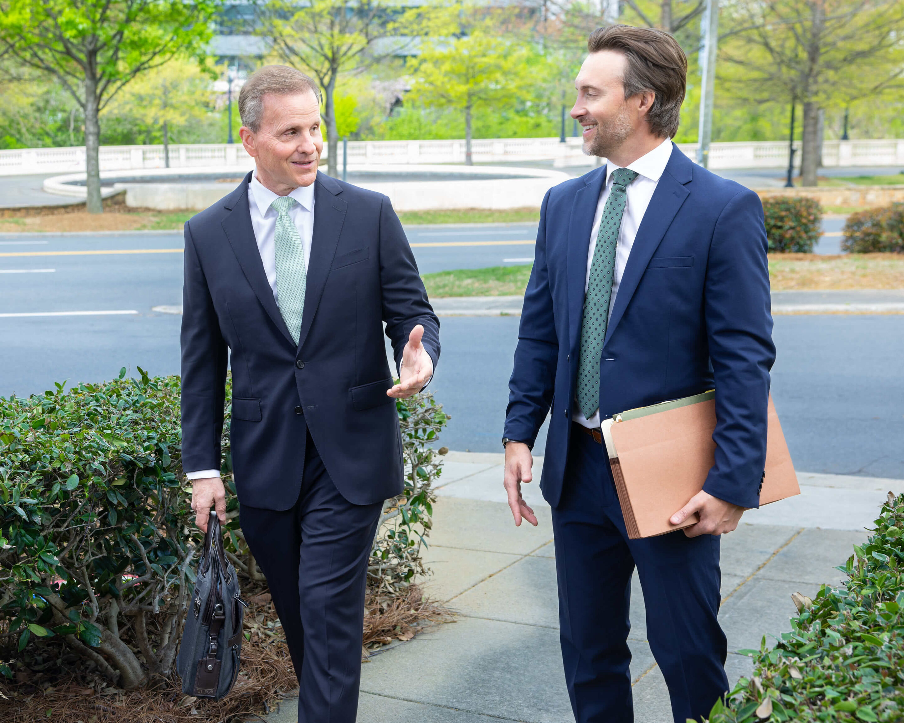 auger.auger-headshot-charlotte-fenixfoto-9V5A3168 - 12 Auger and Auger attorney's walking outside for a lifestyle photoshoot